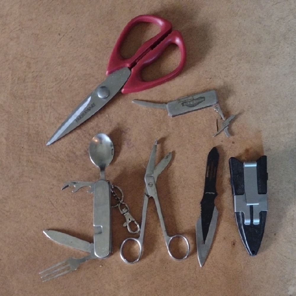 Multi-Tool Grooming Kit with Red Scissors